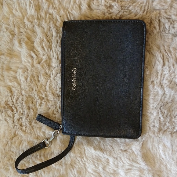 Calvin Klein black wristlet. - Picture 1 of 4